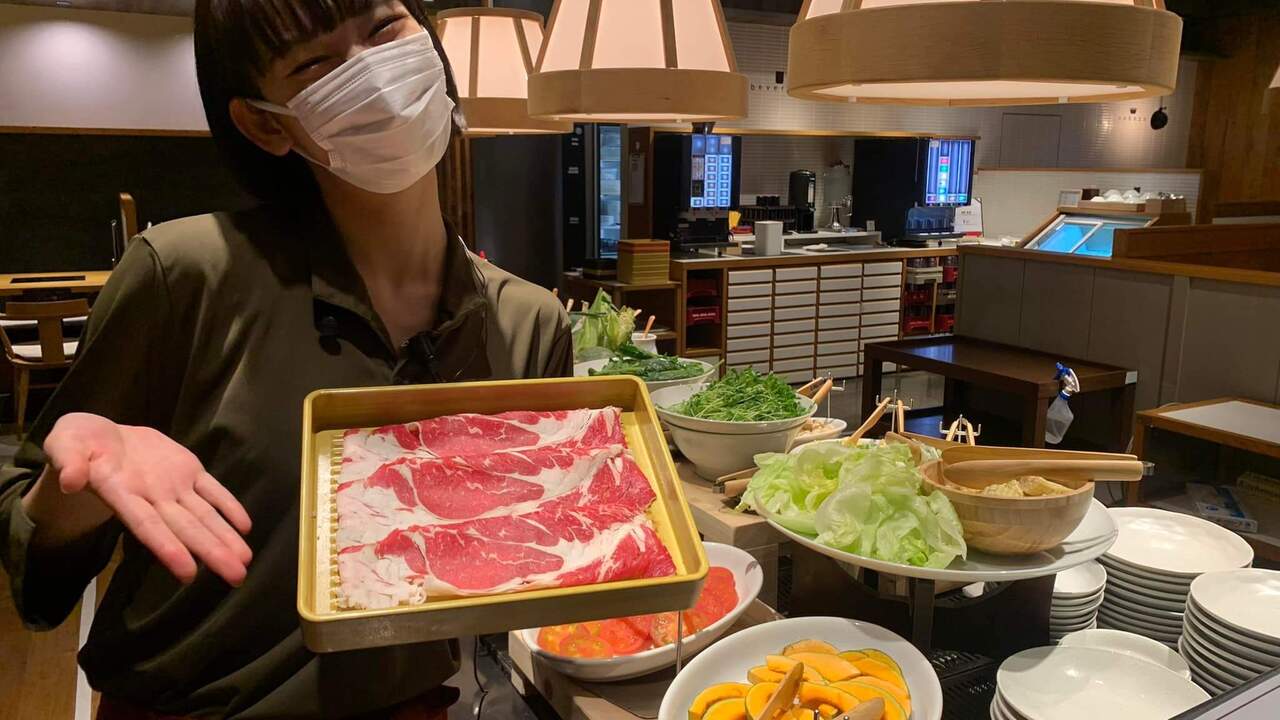 鍋ぞうで働く人の写真1枚目