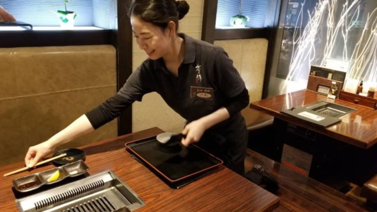 千日前 李休で働く人の写真4枚目