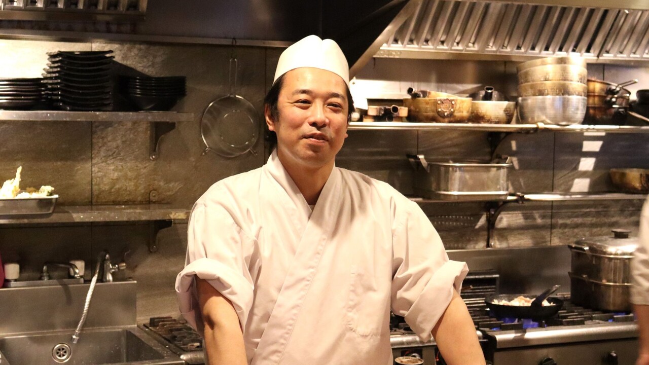 門で働く人の写真2枚目