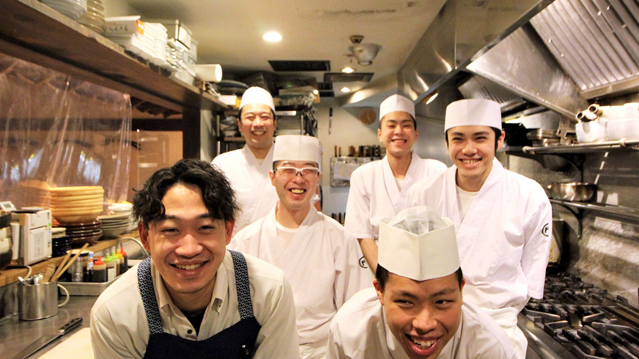 門で働く人の写真4枚目