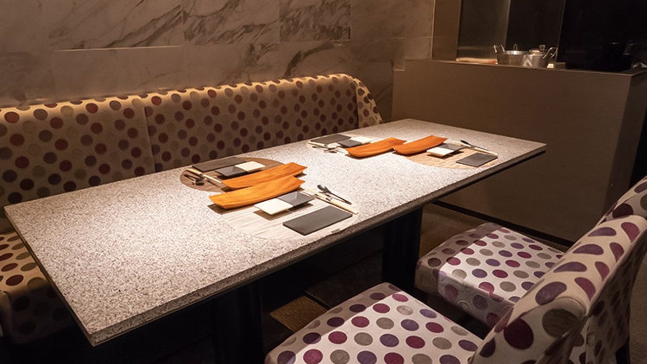 口勝で働く人の写真1枚目