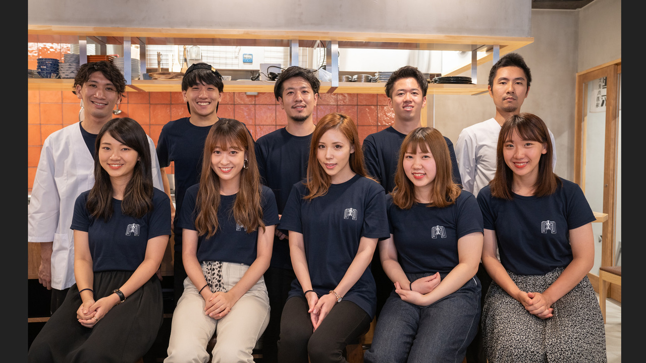 よし臓 で働く人の写真1枚目